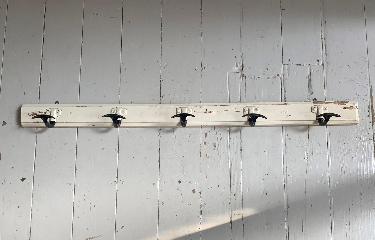 Vintage Wall Mounted Cream/Black Metal Coat Hooks x 5 on Wooden Painted Board
