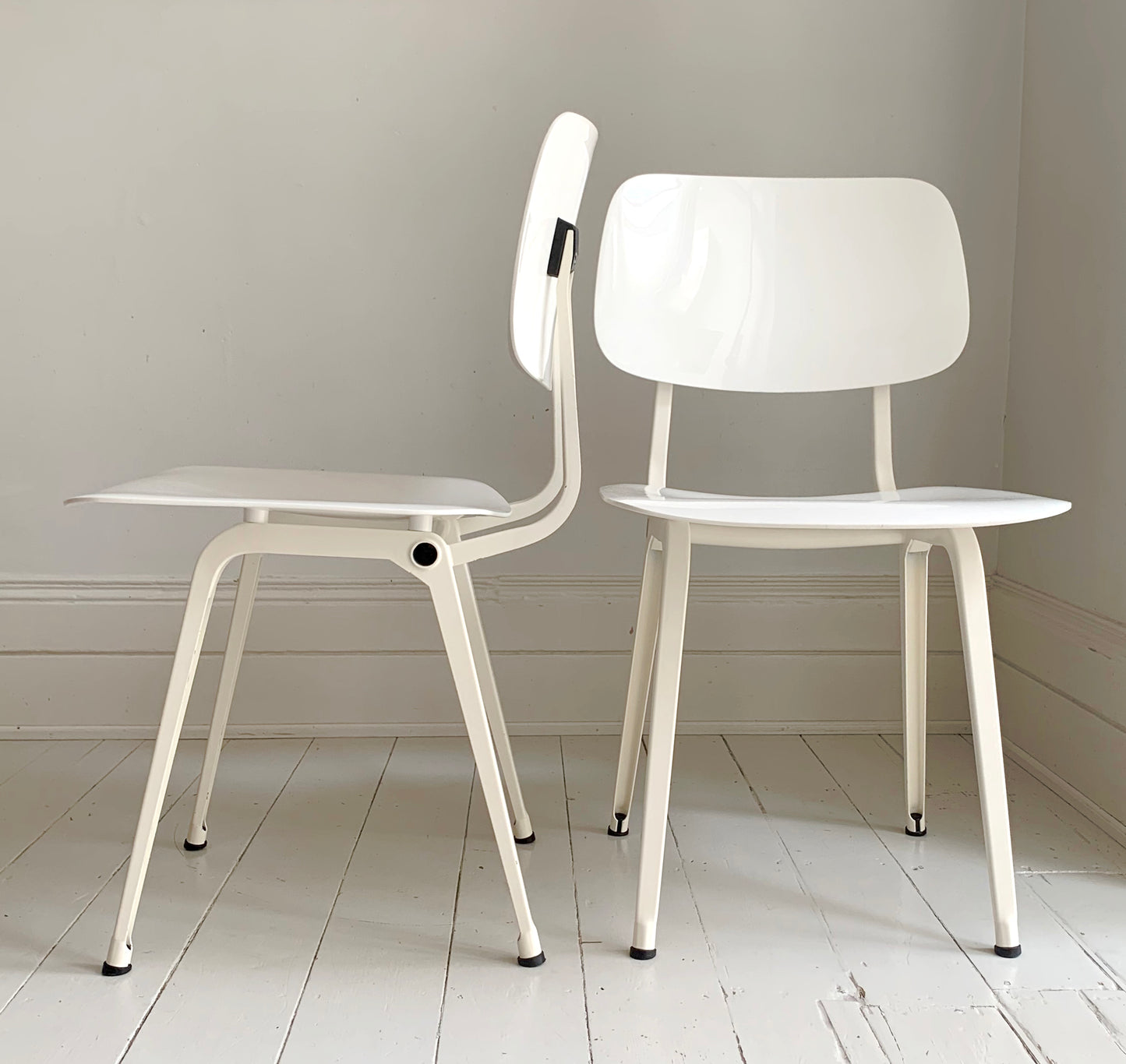 A Pair of Friso Kramer for Ahrend 'Revolt' White High Gloss Dining Chairs