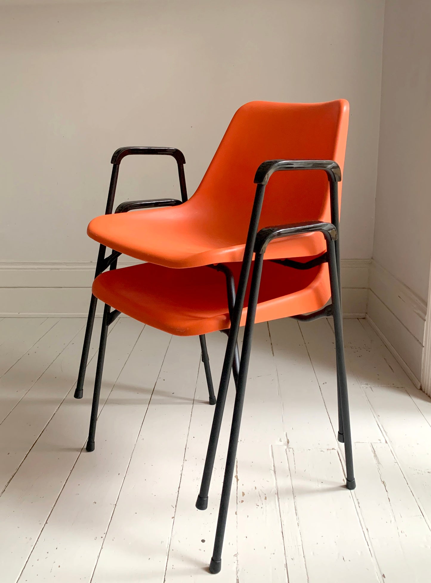 Vintage Robin Day for Hille, Orange & Black Stacking Chairs w/ Arms, 2/10 chairs