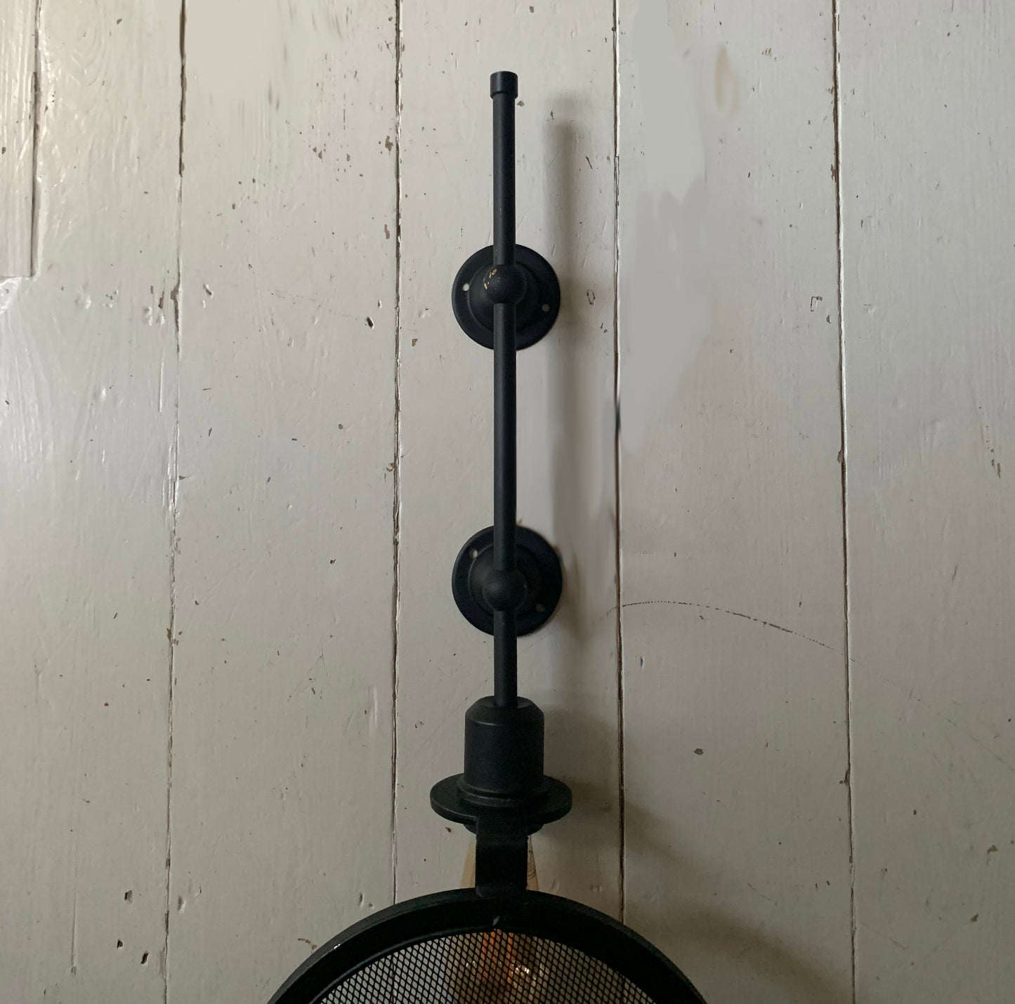 Industrial Black Metal Wall Mounted Light Fitting with Metal Mesh Bulb Cover