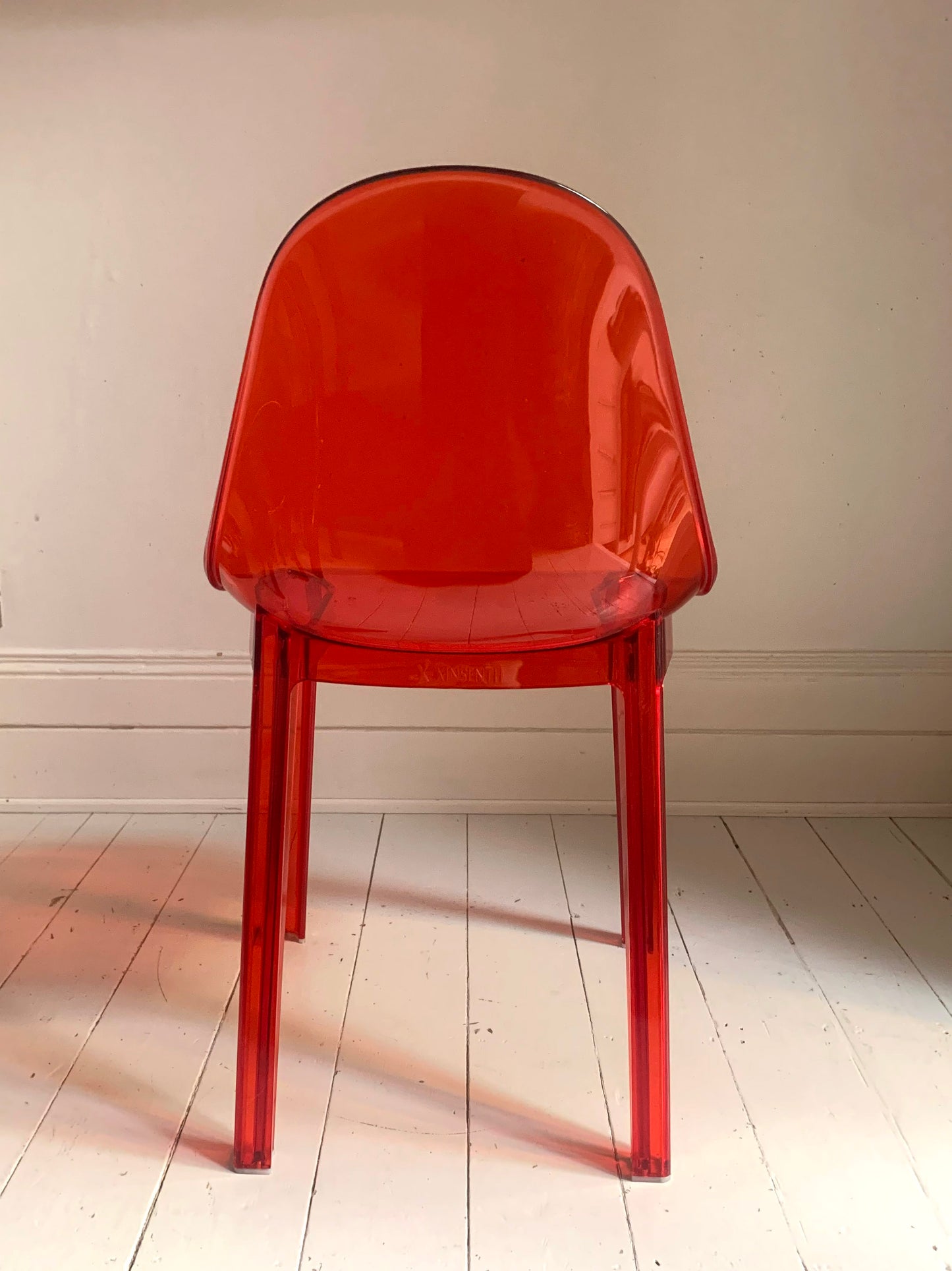 Four x Stackable Dining Chairs in Red Transparent Plastic