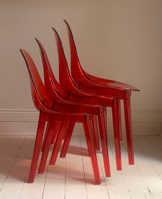 Four x Stackable Dining Chairs in Red Transparent Plastic