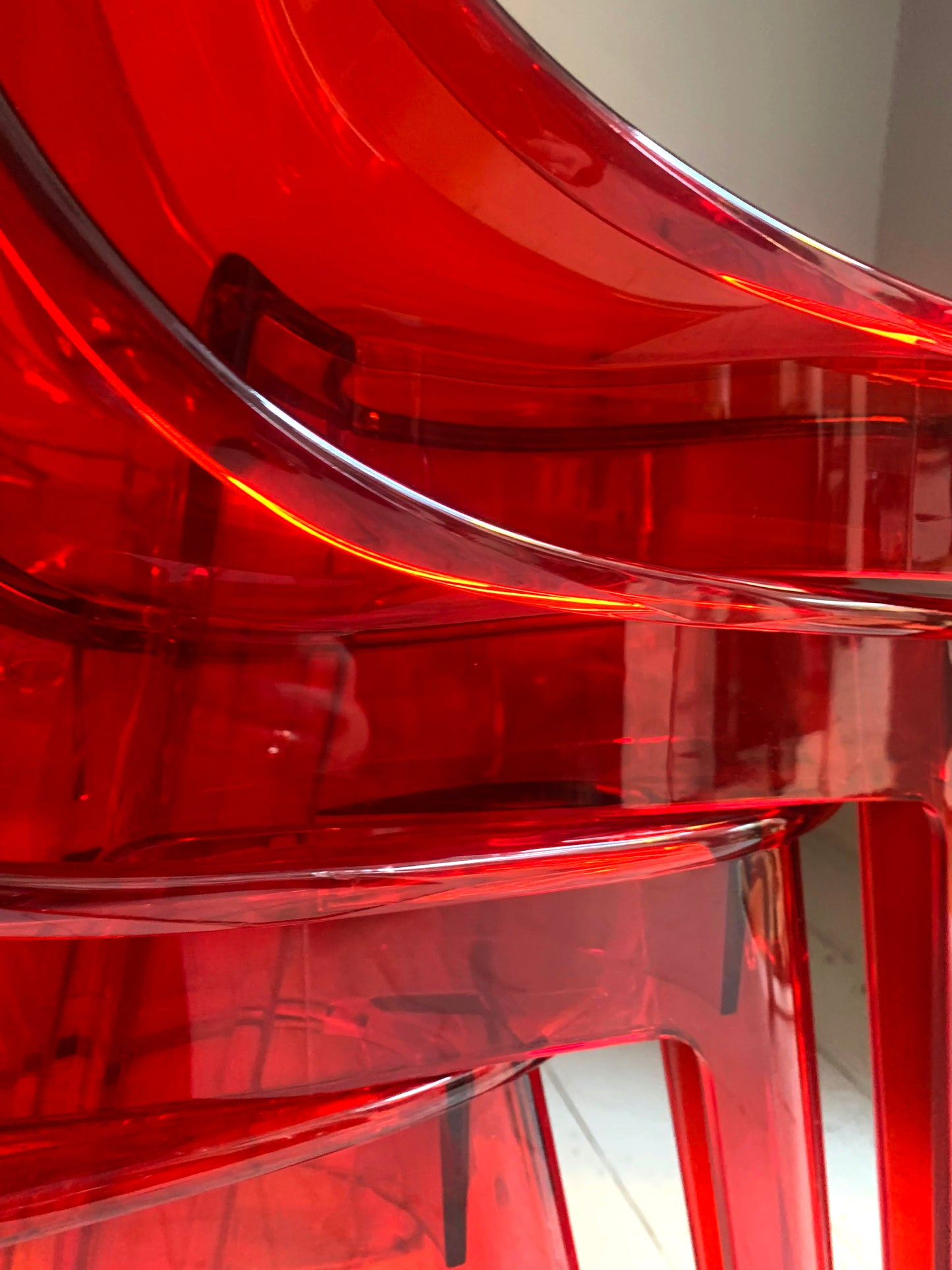 Four x Stackable Dining Chairs in Red Transparent Plastic