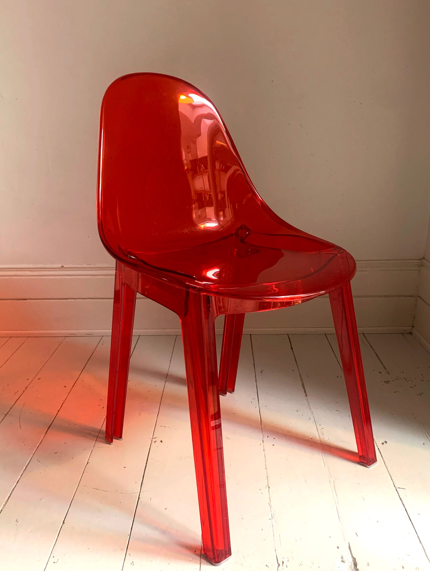 Four x Stackable Dining Chairs in Red Transparent Plastic