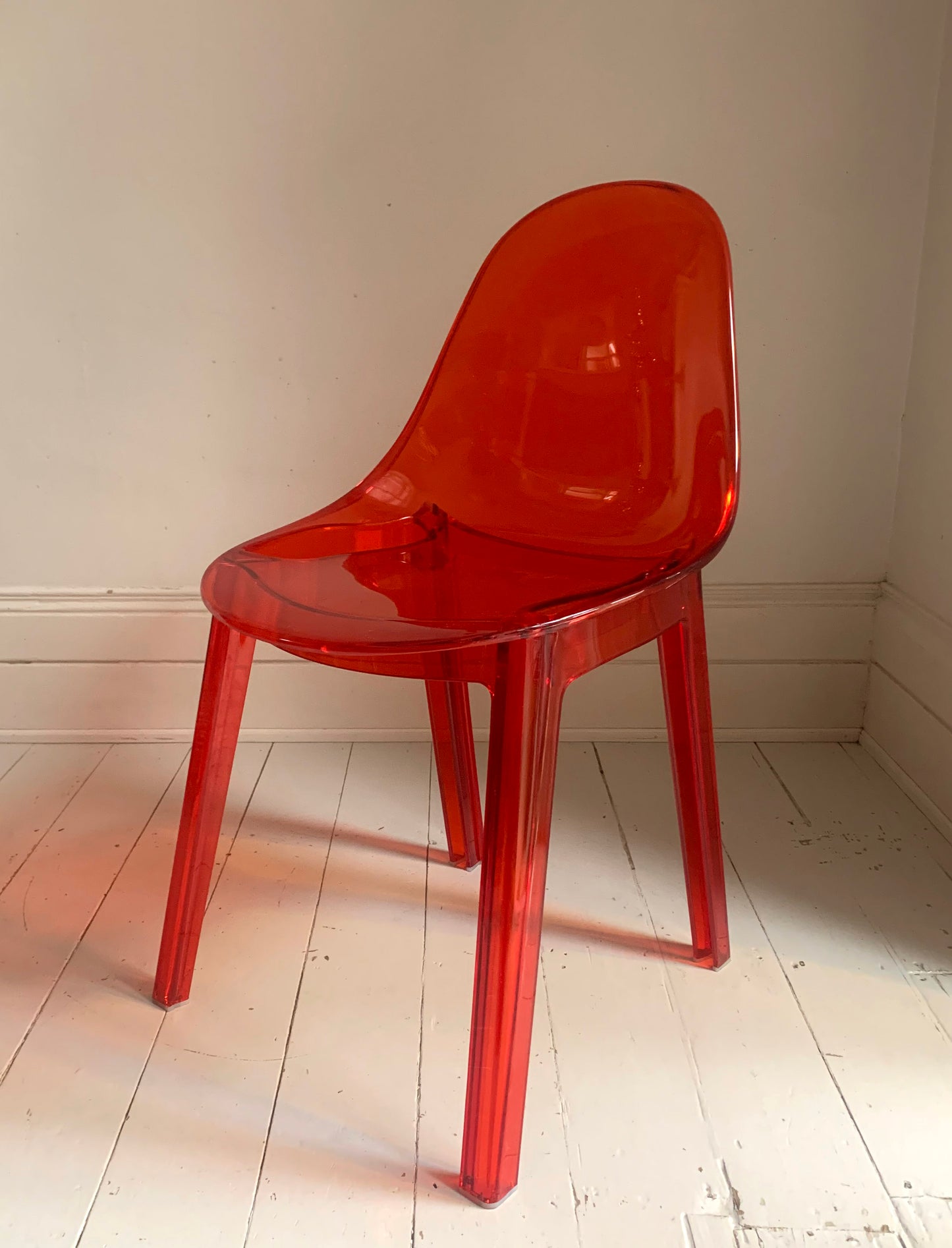 Four x Stackable Dining Chairs in Red Transparent Plastic