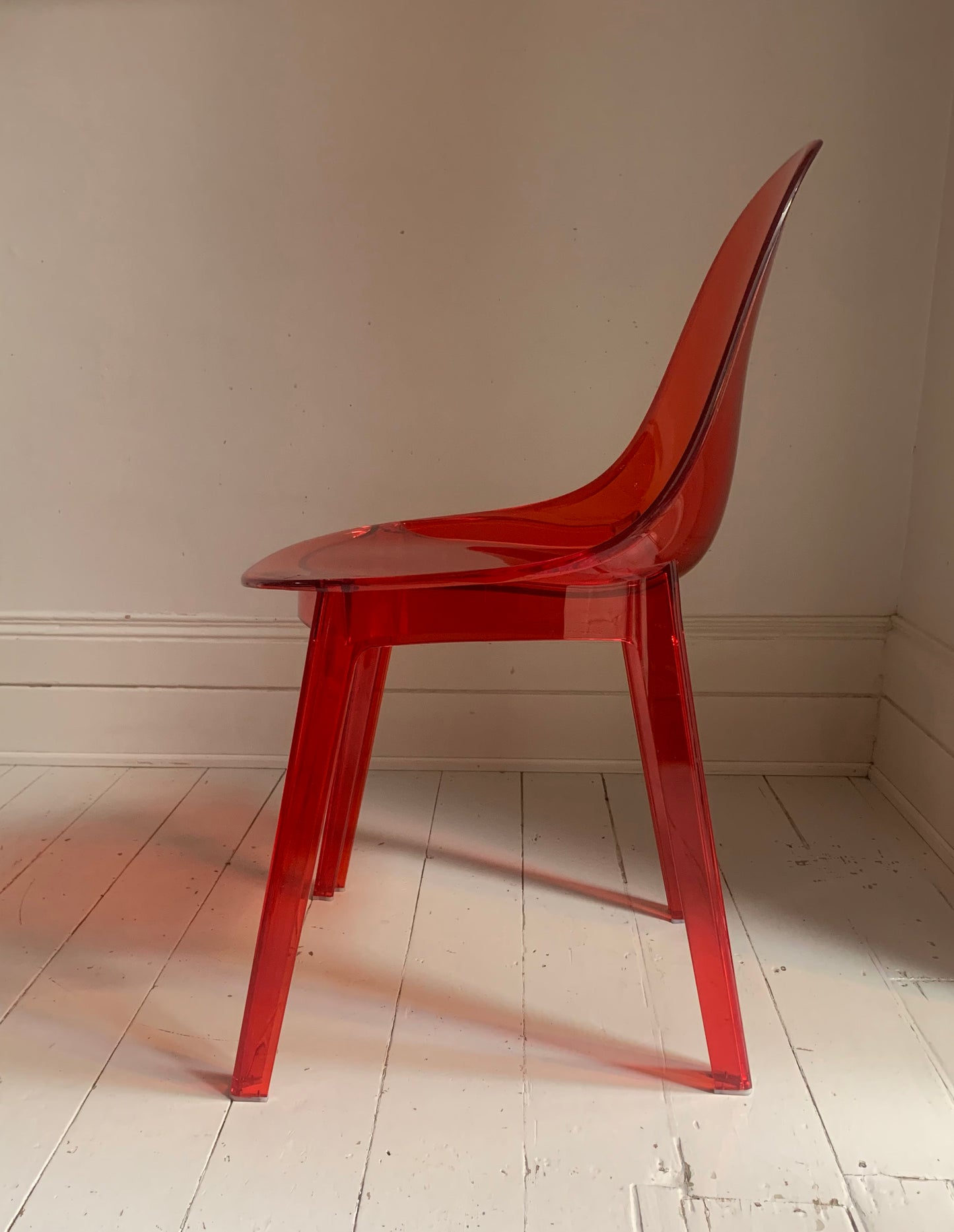 Four x Stackable Dining Chairs in Red Transparent Plastic