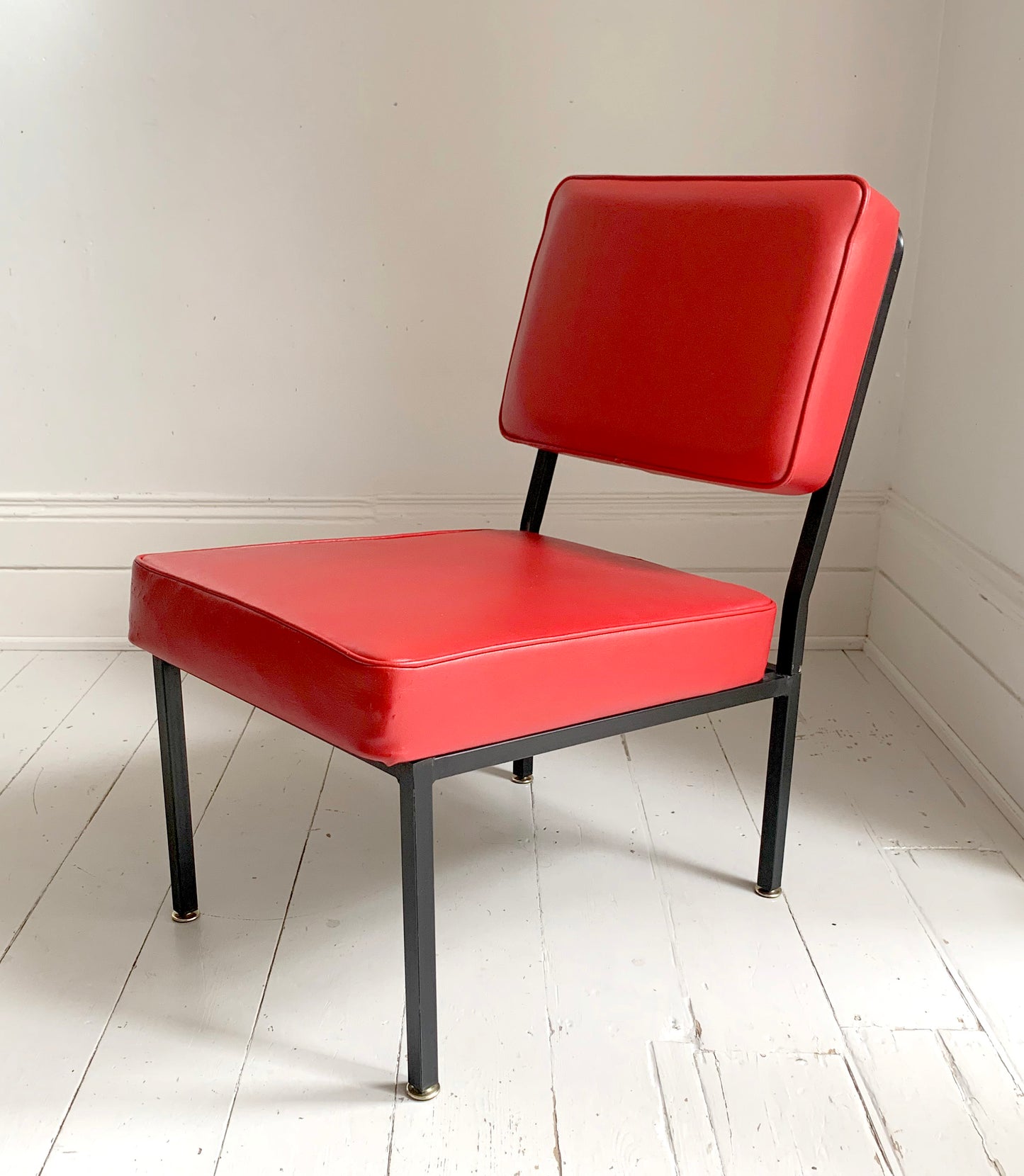 Mid Century Pair of Red Vinyl Lounge Chairs With Brass Feet