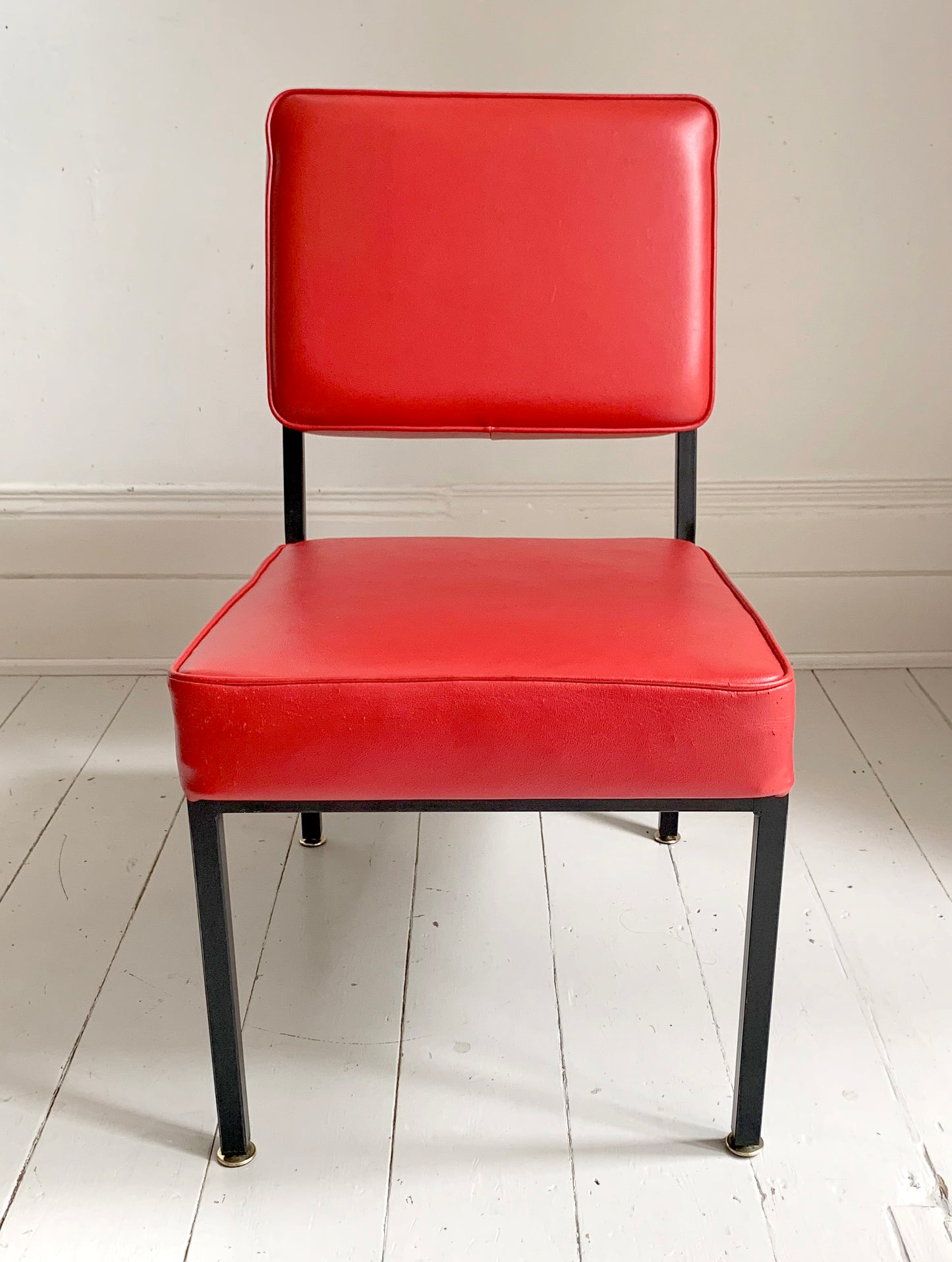 Mid Century Pair of Red Vinyl Lounge Chairs With Brass Feet