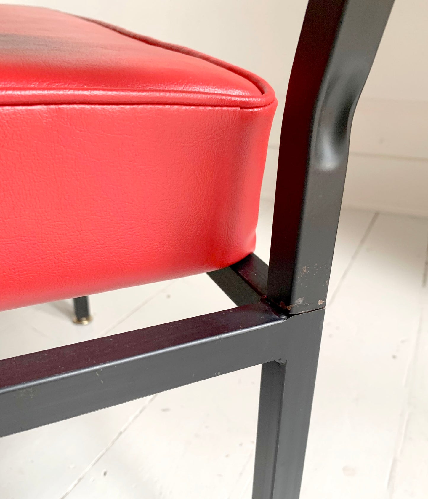 Mid Century Pair of Red Vinyl Lounge Chairs With Brass Feet