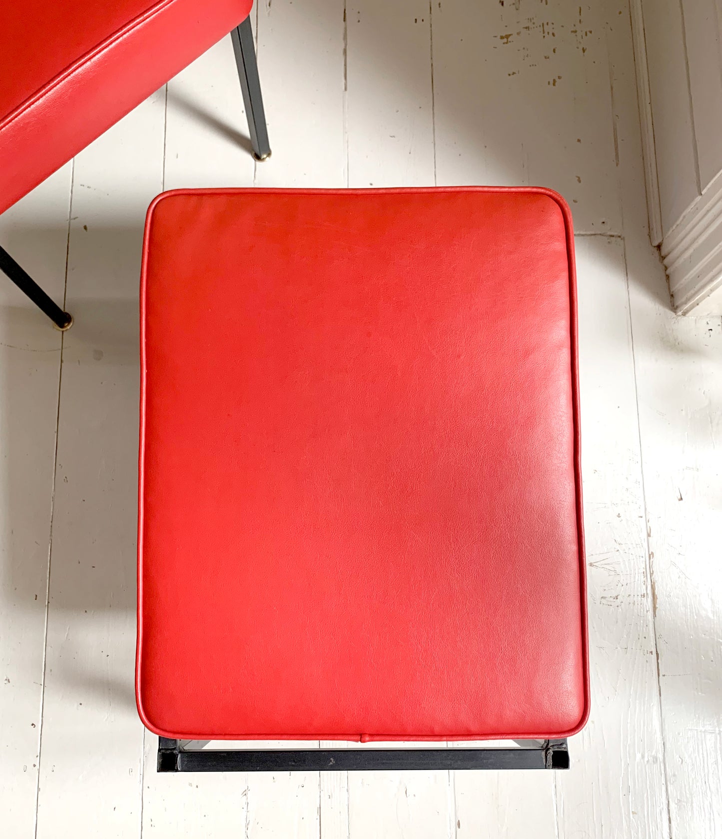 Mid Century Pair of Red Vinyl Lounge Chairs With Brass Feet