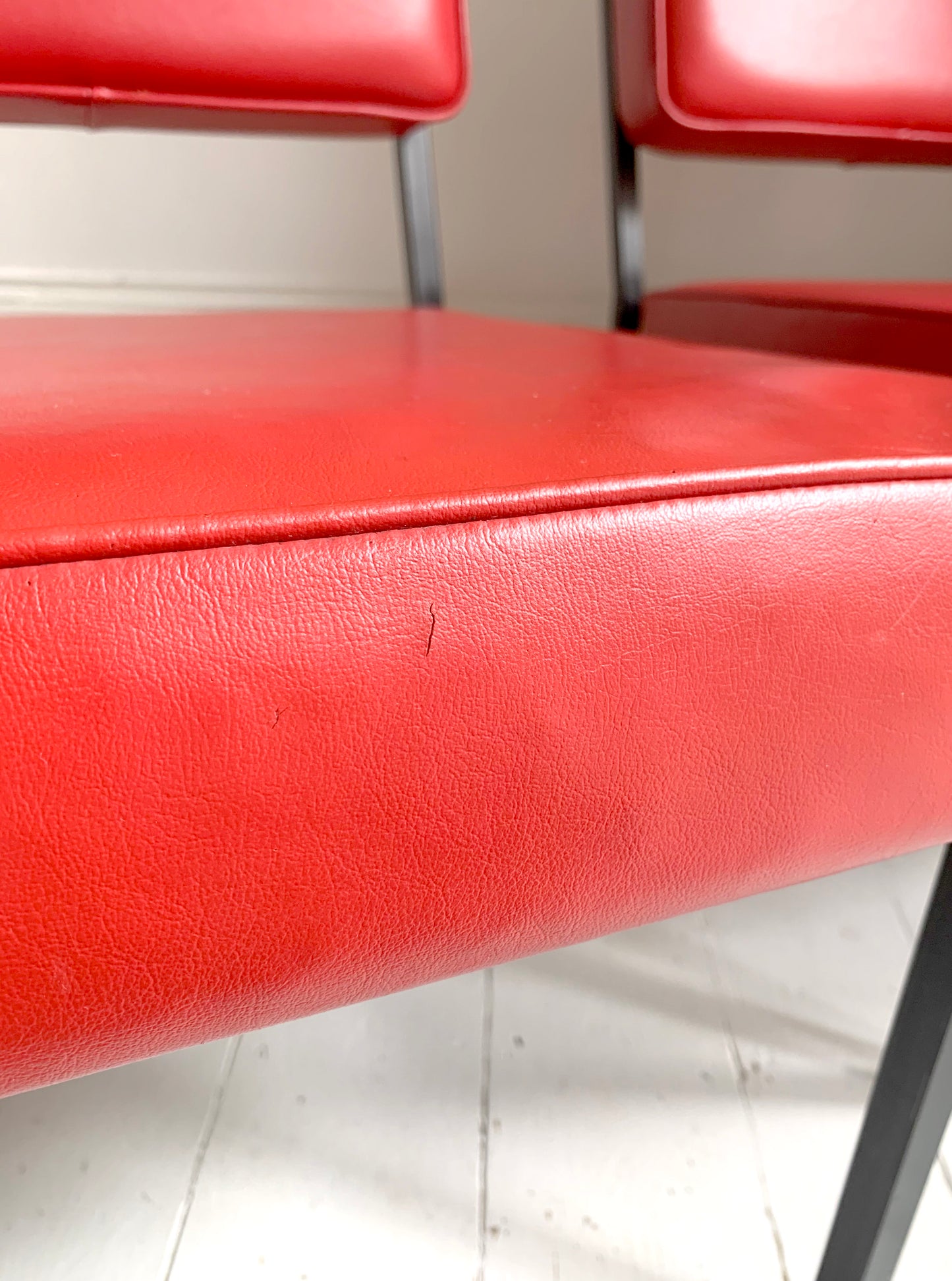 Mid Century Pair of Red Vinyl Lounge Chairs With Brass Feet