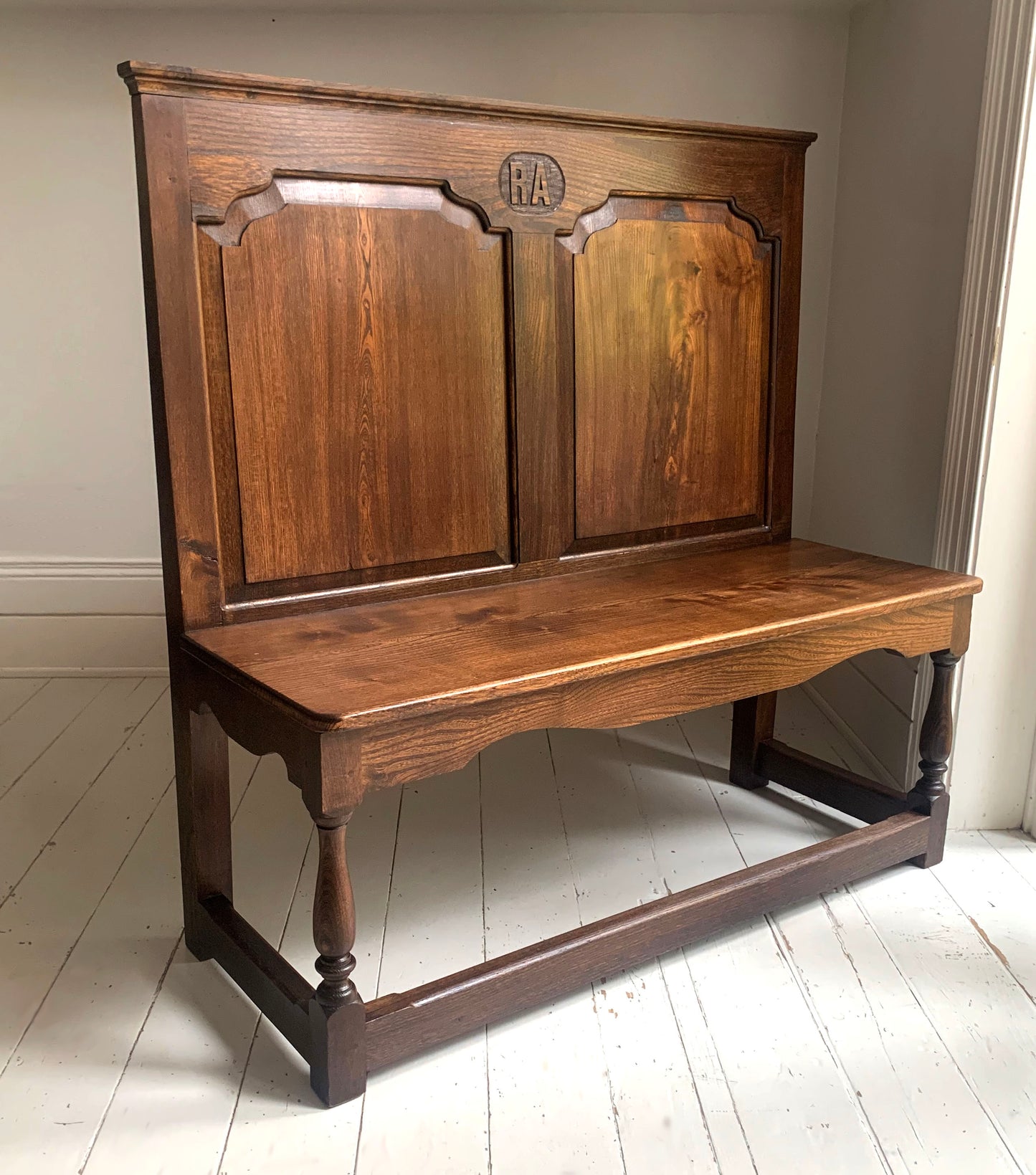 Antique Oak Panelled Back Settle Without Arms with RA Initial Carving