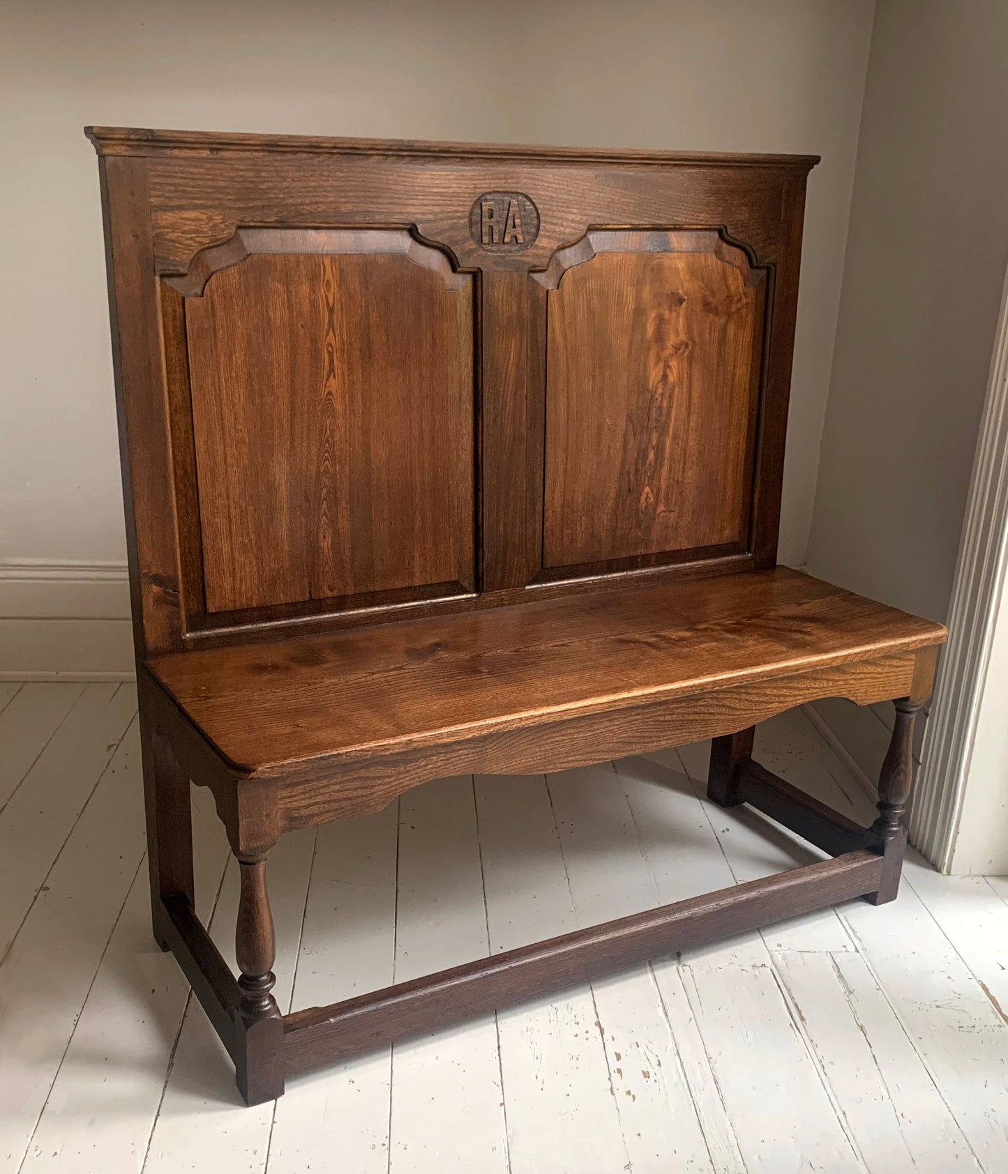 Antique Oak Panelled Back Settle Without Arms with RA Initial Carving