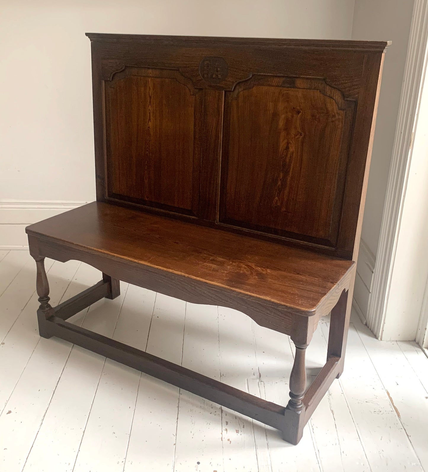 Antique Oak Panelled Back Settle Without Arms with RA Initial Carving