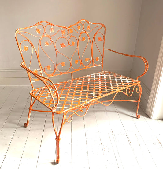 Vintage Ornate Wrought Iron Two Seater Garden Bench, Leaf Design in Faded Orange