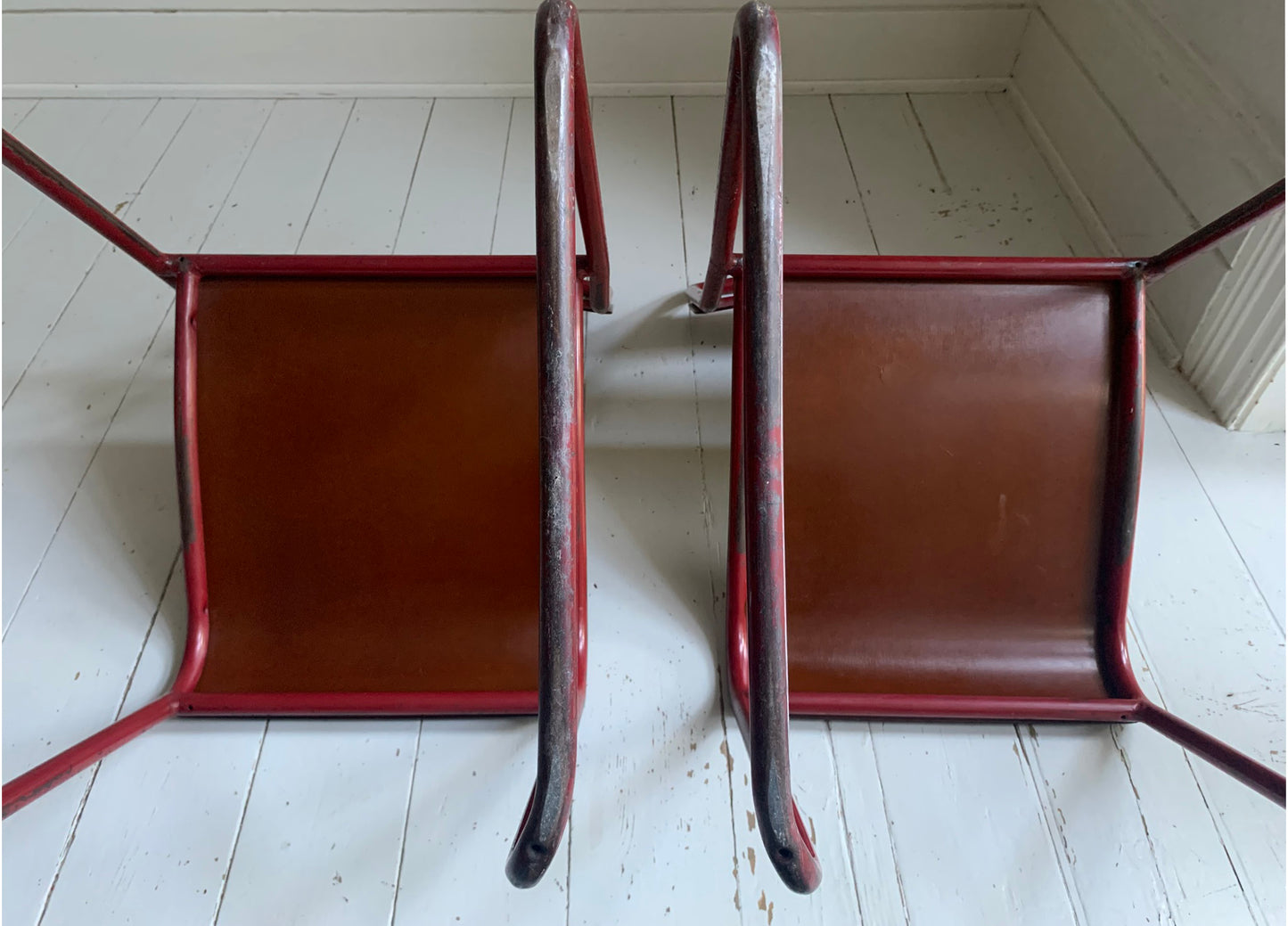 Vintage Cox Stacking Chairs; A Pair Tubular Steel Chairs with Rich Red Patina