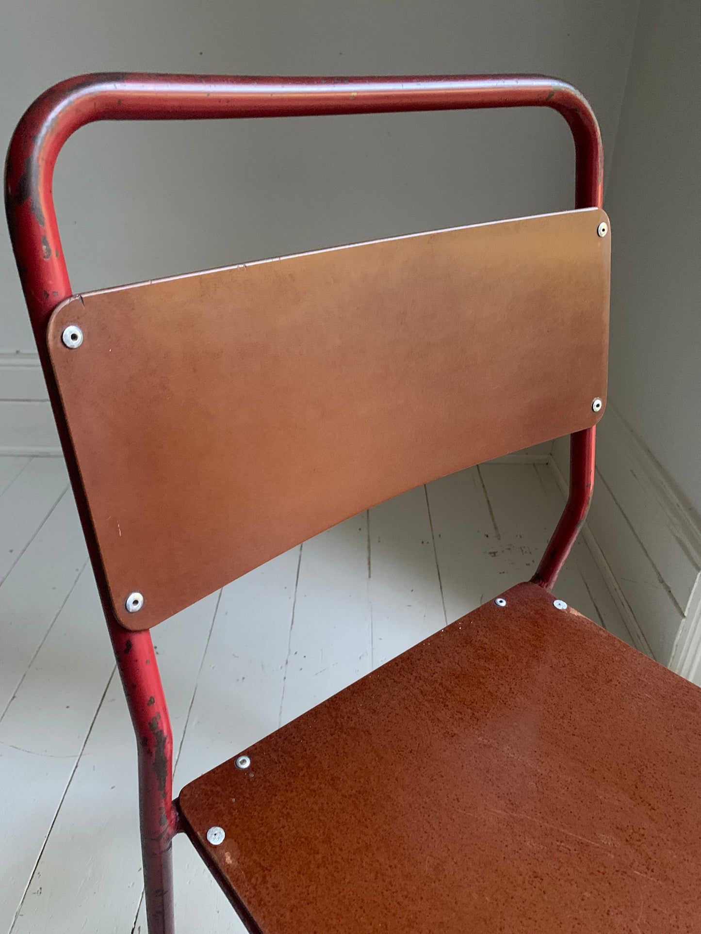 Vintage Cox Stacking Chairs; A Pair Tubular Steel Chairs with Rich Red Patina