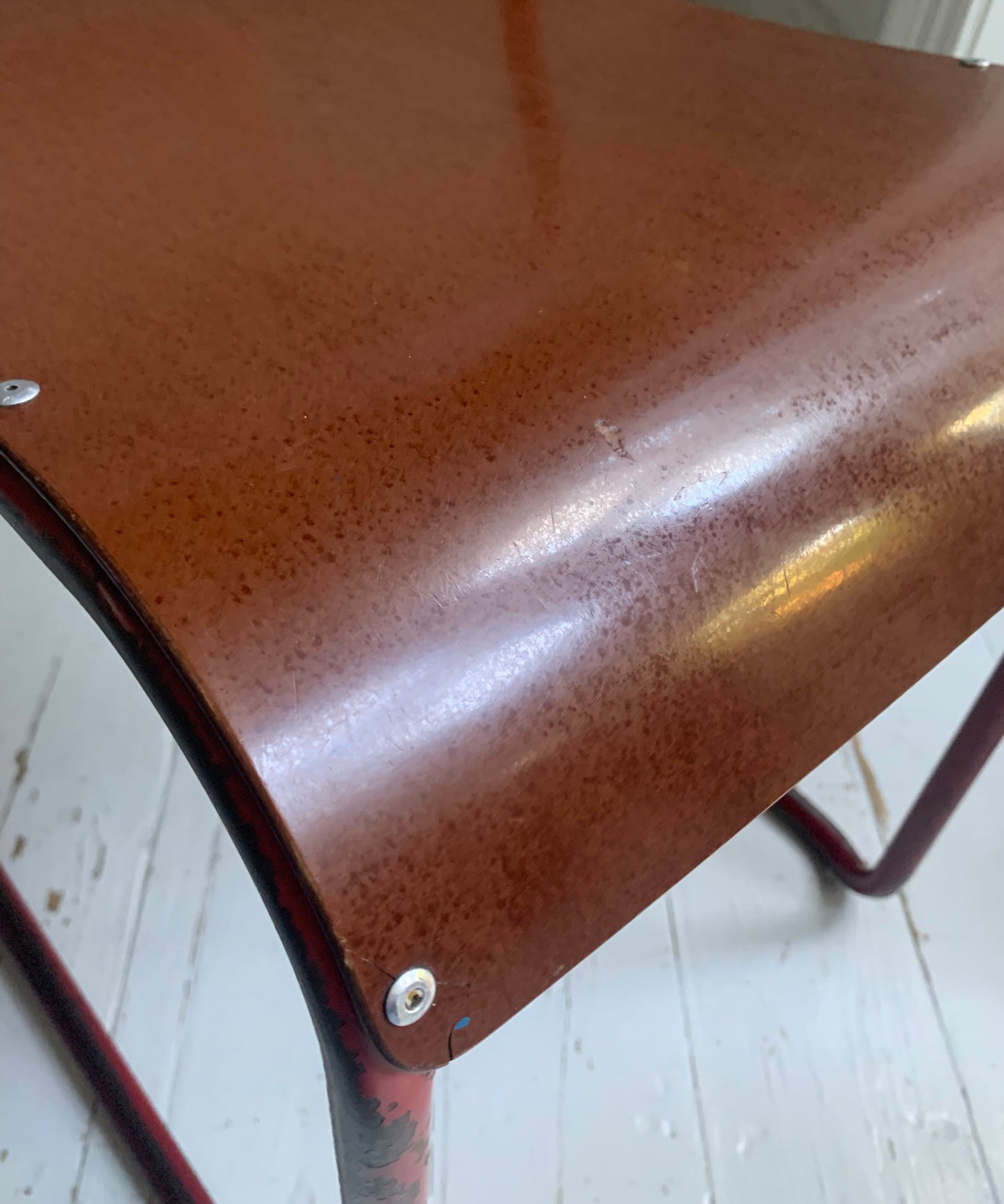 Vintage Cox Stacking Chairs; A Pair Tubular Steel Chairs with Rich Red Patina