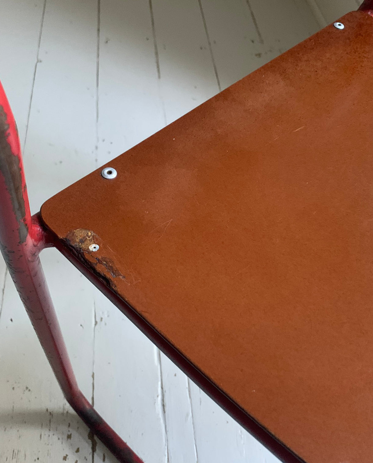 Vintage Cox Stacking Chairs; A Pair Tubular Steel Chairs with Rich Red Patina