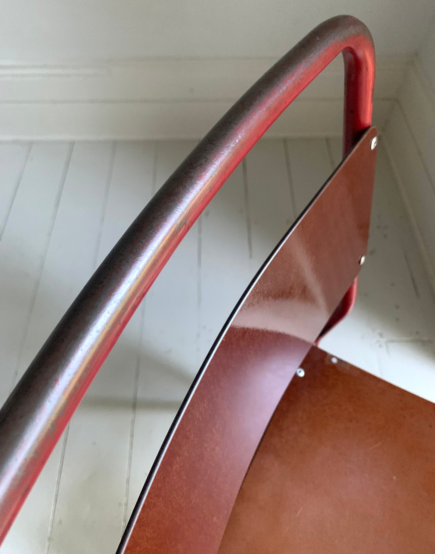 Vintage Cox Stacking Chairs; A Pair Tubular Steel Chairs with Rich Red Patina