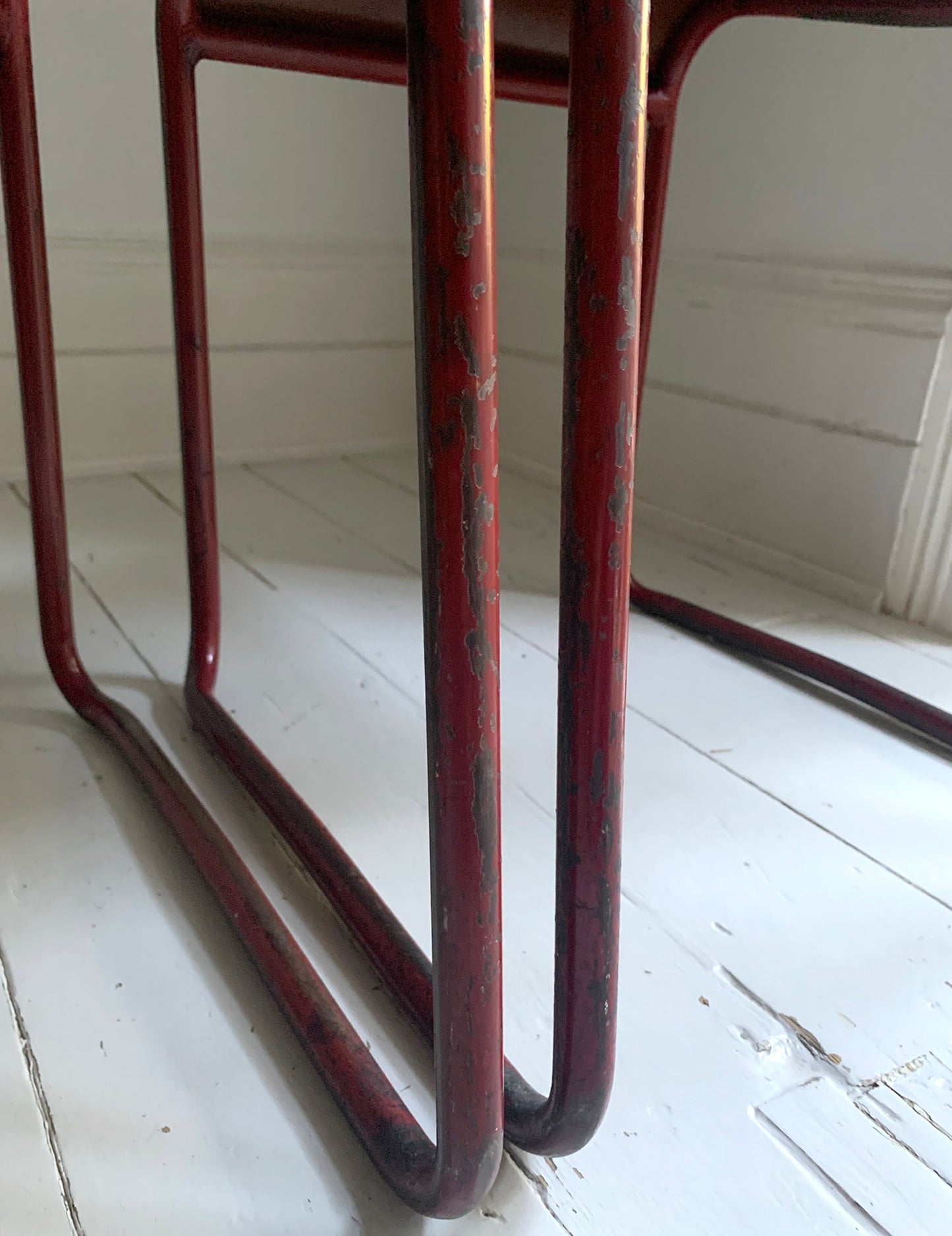 Vintage Cox Stacking Chairs; A Pair Tubular Steel Chairs with Rich Red Patina